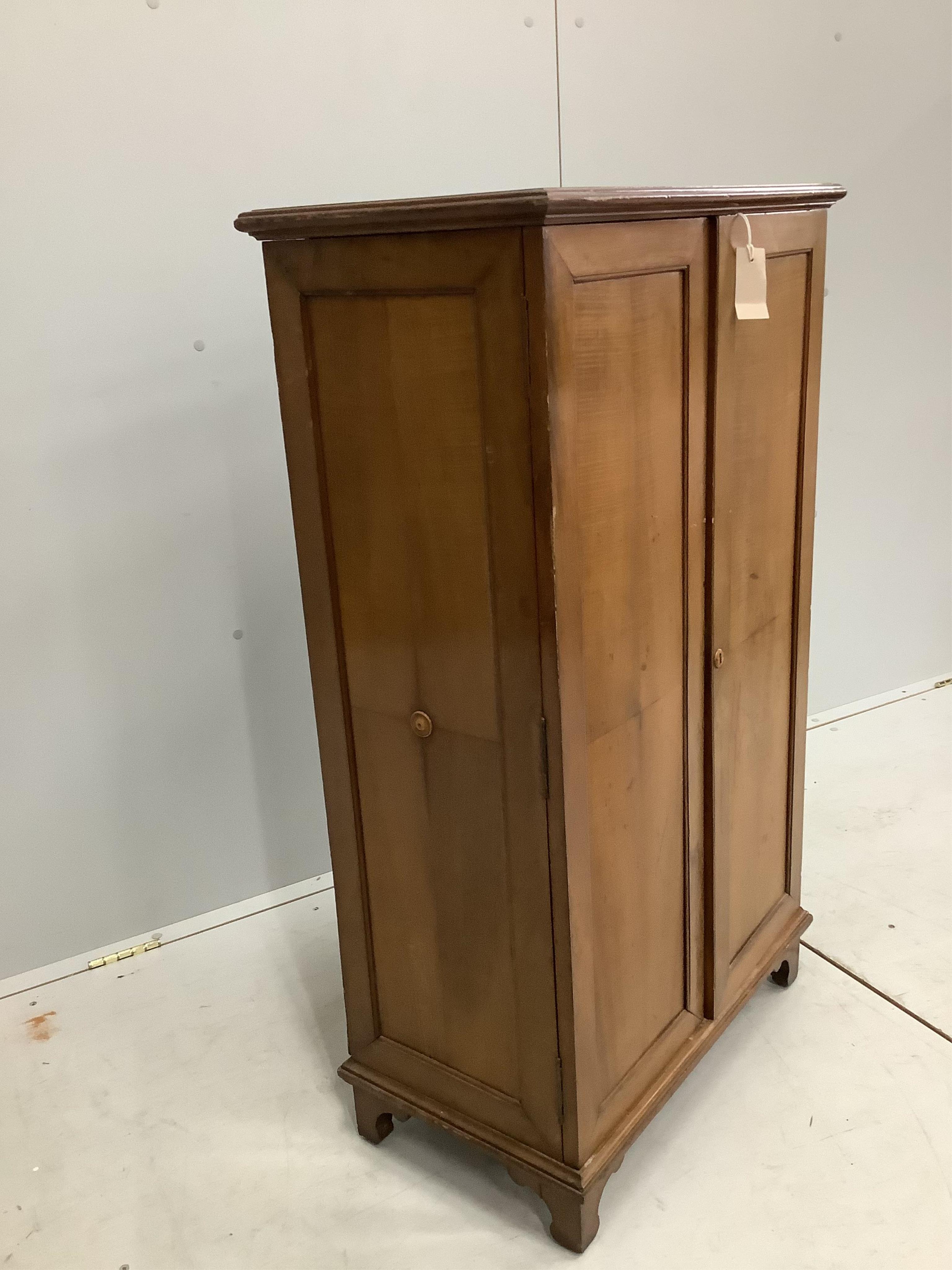 An early 20th century walnut office cabinet fitted with nine deep drawers, width 61cm, height 106cm. Condition - fair, a little faded